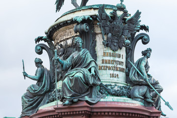 Fototapeta na wymiar Middle part of the monument to Nicholas I with allegorical female figures, Saint Petersburg, Russia architect Montferrand 1856