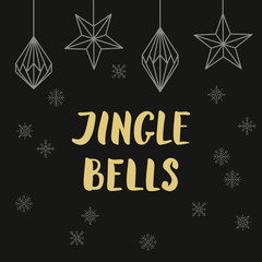 Golden lettering Jingle bells with christmas decorations and snowflakes on black