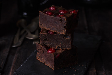 Chocolate brownies with cherries