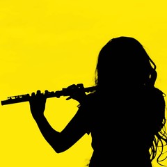silhouette lady playing flute © thaninee