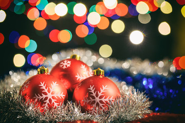 Fototapeta na wymiar Christmas balls on a blur background