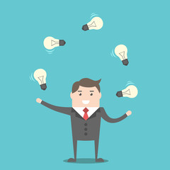 Businessman juggling light bulbs