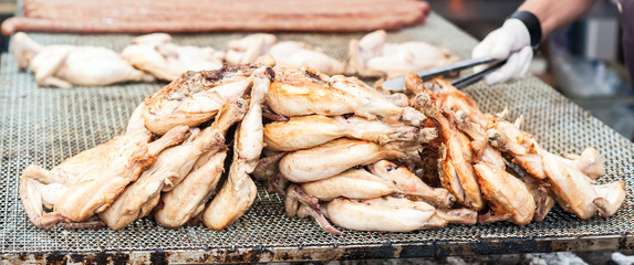 Chicken thighs cooked on the grill.