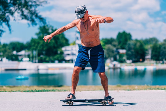Senior skateboarder. Senior male on skateboard