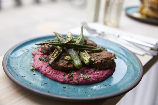 Close up of lamb koftas on table in restaurant