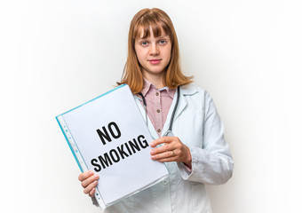 Female doctor showing clipboard with written text: No Smoking