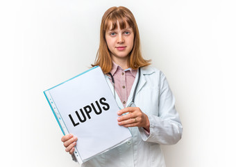 Female doctor showing clipboard with written text: Lupus