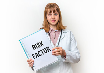 Doctor showing clipboard with written text: Risk Factor