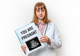Doctor showing clipboard with written text: You Are Pregnant