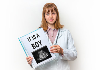 Doctor showing clipboard with written text: It is a Boy