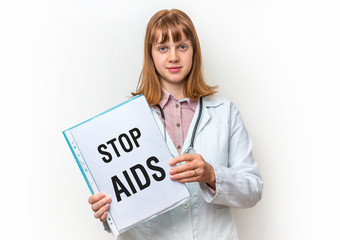 Female doctor showing clipboard with written text: Stop AIDS