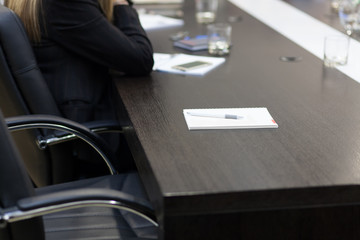 empty seat at the conference table