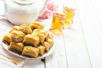  traditional eastern desserts on wooden background