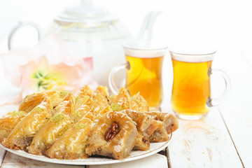 traditional eastern desserts on wooden background