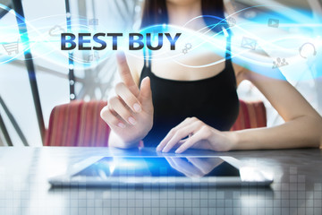 Woman is using tablet pc, pressing on virtual screen and selecting best buy