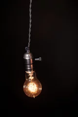 Fotobehang Bulbs on black background © Pixelatelier.at