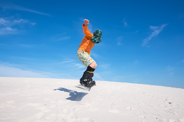  Snowboarder is jumping, fun, in preparation for the new winter