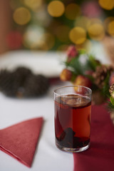 Glass of compote on Christmas table