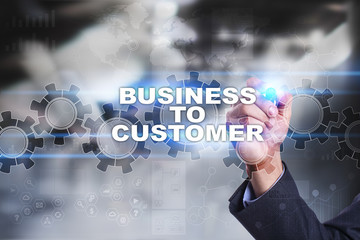 Businessman is drawing on virtual screen. business to customer concept.