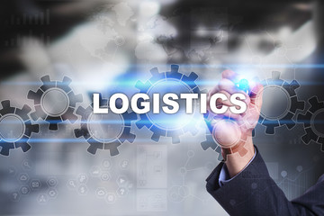 Businessman is drawing on virtual screen. logistics concept.