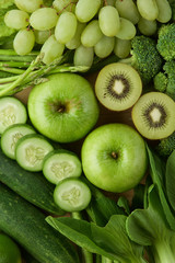 Fototapeta na wymiar Healthy eating background. Various of green fruits and vegetable