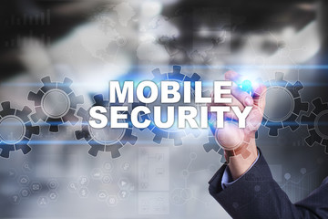 Businessman is drawing on virtual screen. mobile security concept.