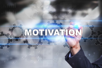 Businessman is drawing on virtual screen. motivation concept.