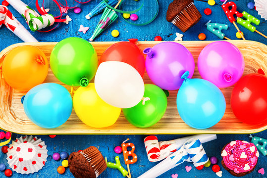 Colorful birthday background with multicolored balloons