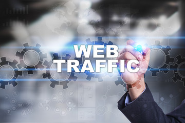 Businessman is drawing on virtual screen. web traffic concept.