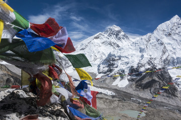 Beautiful Landscape of  Everest and Lhotse peak with colorful Nepali flag as foreground from Kala Pattar view point. Gorak Shep. During the way to Everest base camp. Sagarmatha national park. Nepal.