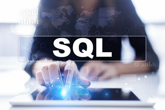 Woman is using tablet pc, pressing on virtual screen and selecting sql