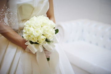 Bride holding wedding bouquet