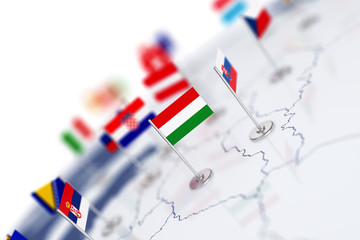 Hungary flag in the focus. Europe map with countries flags