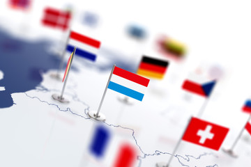 Luxembourg flag in the focus. Europe map with countries flags