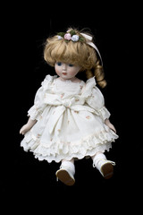 Close Up and Isolated Vintage Antique Old Doll