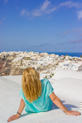 Fototapeta na wymiar Young woman on holidays, Santorini