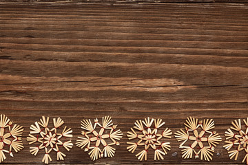 Fototapeta premium Snowflakes Wood Background, Christmas Snow Flakes, Winter Decoration