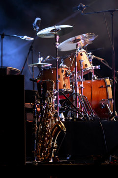 drum kit and saxofone in night scene