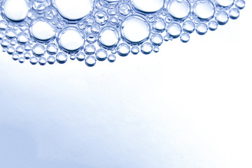 Soapsuds background with air bubbles abstract texture. Blur