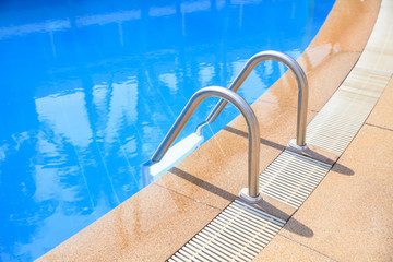 Swimming pool with stair at hotel