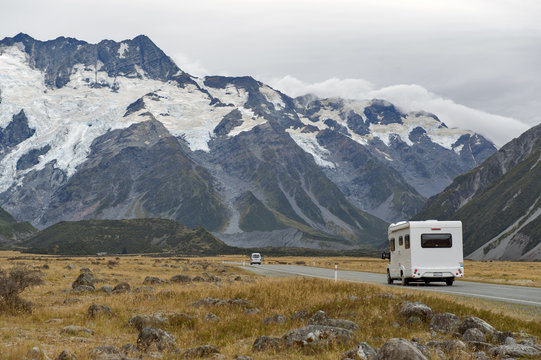 Motorhome on Mount Cook Road (State Highway 80) along the Tasman River leading to Aoraki / Mount Cook National Park and the village