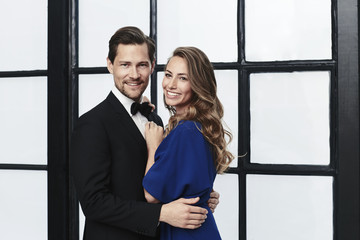 Smiling and glamorous looking at camera