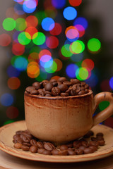 Coffee cup on wooden background in blur background