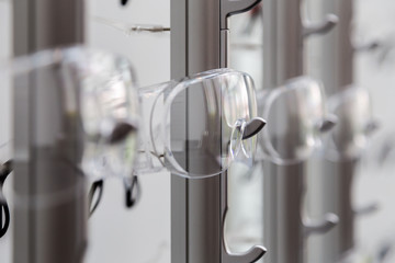 Showcase stand with protective eyewear glasses closeup
