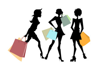 Shopping sillhouettes set. Black sillhouettes of women with colorful shopping bags on white background. Elegant, young and slim women.