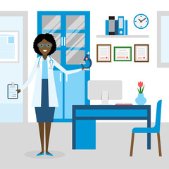 Doctor in the cabinet. Funny smiling african american female doctor in the medical cabinet. Medical treatment, first aid.