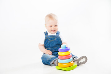 Adorable toddler playing with toy