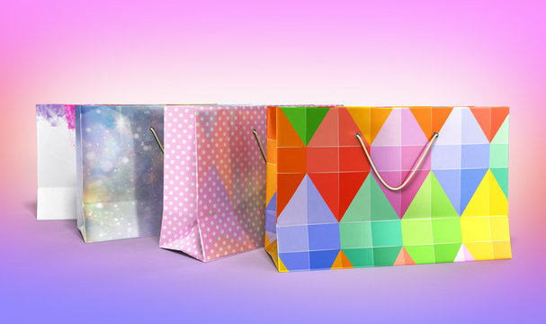coloder paper bags 3d render on gradient background