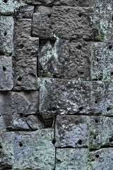Lichen-covered mortarless stone block wall, Preah Khan Temple, Siem Reap, Angkor, Cambodia