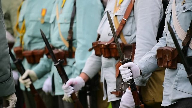 Historical military reenactment with soldier uniforms from World War One